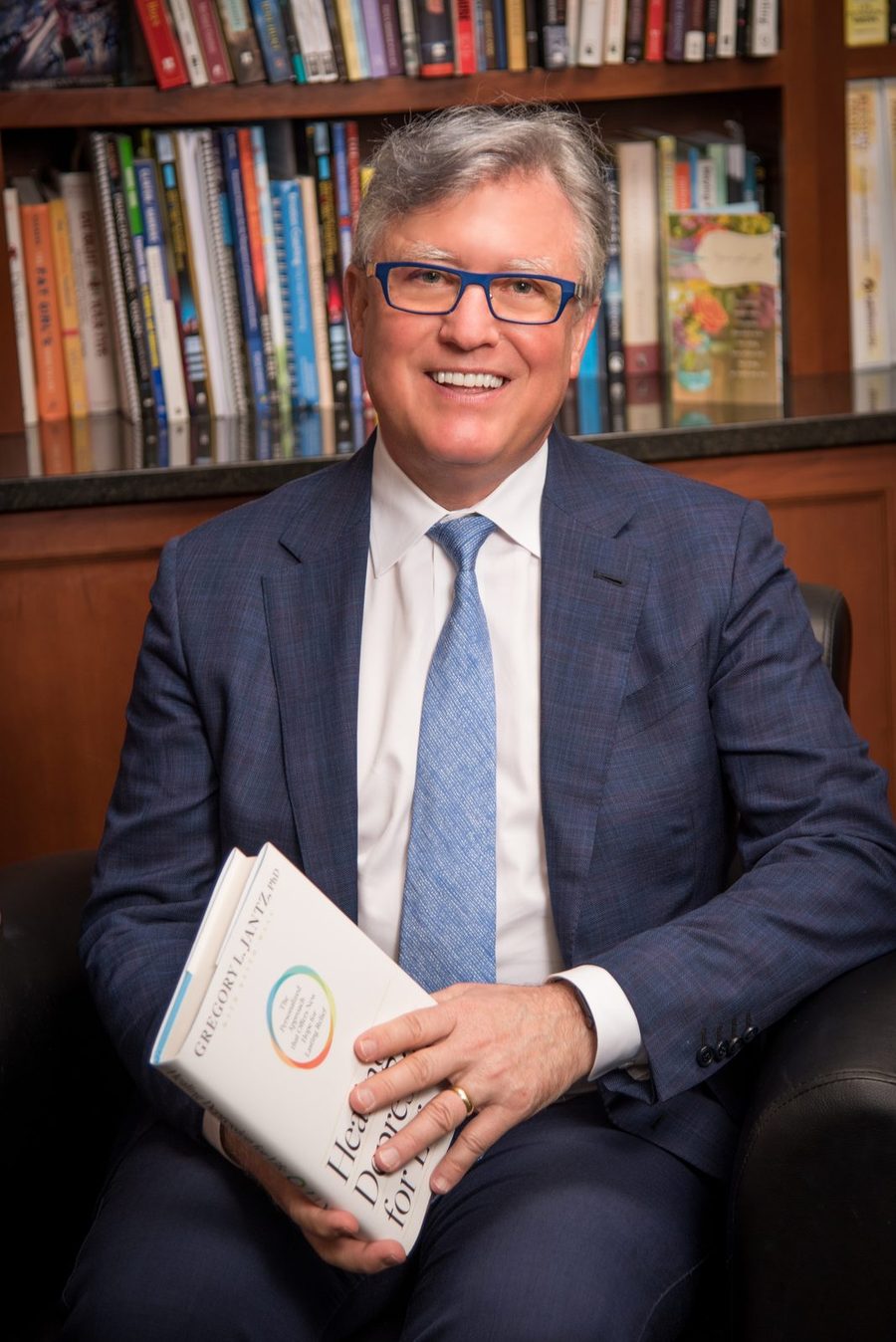 Dr. Jantz holding his book Healing Depression for Life