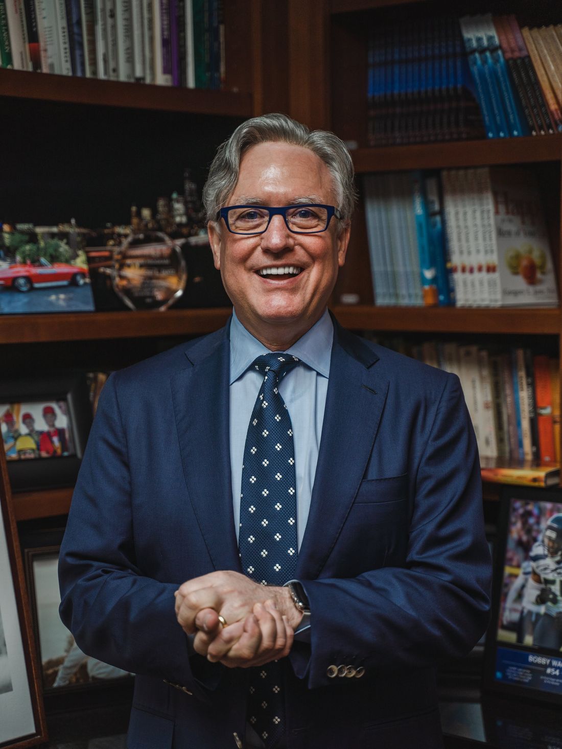 Dr. Gregory Jantz in his library, surrounded by the books he wrote and loved